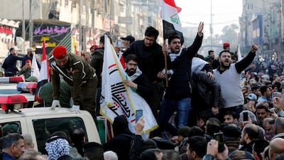 Mourners gesture as they attend the funeral of Qassem Suleimani and Abu Mahdi al-Muhandis, who were killed in an air strike at Baghdad airport, in Baghdad. Reuters