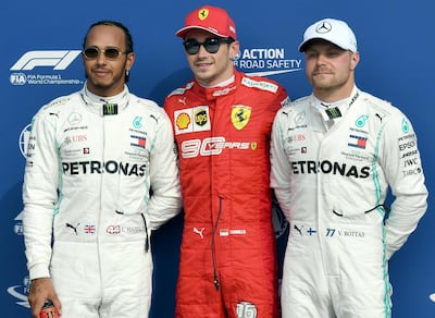 Ferrari driver Charles Leclerc, centre, secured pole at Sunday's Italian Grand Prix ahead of the Mercedes pair Lewis Hamilton, left, and Valtteri Bottas, right. EPA