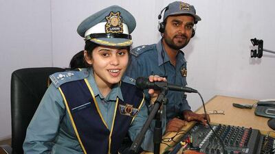 From left: Sumaira Shaukat and Suhail Arshad of the Pakistan Traffic Police's FM Radio project during their test transmission.