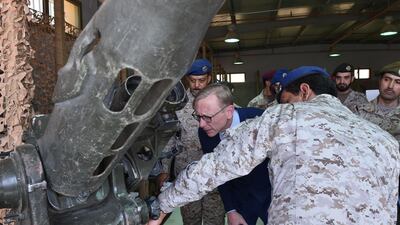 Brian Hook, the US special representative on Iran, checks an Iranian-made launcher used by Houthi rebels in Yemen on June 21. AFP