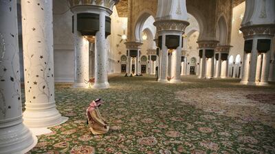 Prayers at Sheikh Zayed Grand Mosque. September 2, 2008. Galen Clarke / The National