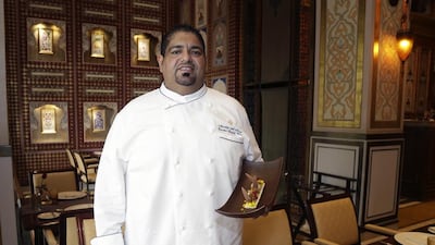 Musabbeh Al Kaabi of Jumeirah Zabeel Saray with his date creme brulee. Jeffrey E Biteng / The National