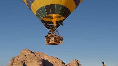 Images for Louis Vuitton's new campaign were shot in Jordan. One features a hot air balloon with cases strapped to the basket, rising above the desert. All photos: Viviane Sassen for Louis Vuitton