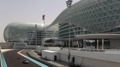 Cars race around Yas Marina Circuit, Abu Dhabi. Ian Walton / Getty Images.