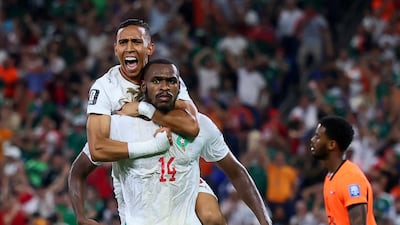 Morocco's Issa Diop after scoring the first goal with Soufiane Rahimi. Reuters