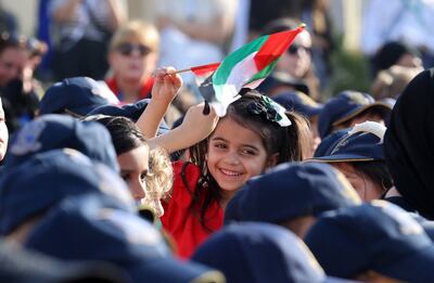 Students, teachers and staff of Repton School Al Barsha celebrate the UAE's 53rd National Day in Dubai. The UAE’s cultural initiatives act as a meeting point for the diverse communities residing in and visiting the country. Pawan Singh / The National