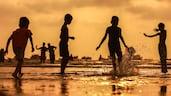 Children cool off at Gorai Beach in Mumbai, India, where a weather warning is in place due to a heatwave. EPA