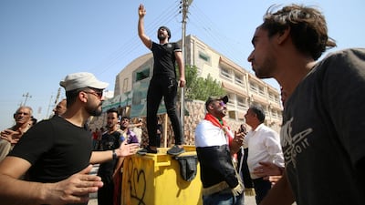 Iraqis protest in front of the Basra provincial council building on July 31, 2018. Reuters