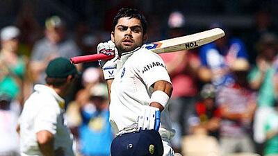 India's Virat Kohli reacts after surviving some tense moments for his first Test century amid alleged sledging by the Australians.