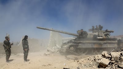 Pro Syrian regime forces are seen as they advance towards the town of Douma, the last opposition holdout in Eastern Ghouta, on April 7, 2018, after regime troops resumed a military blitz to pressure rebels to withdraw. AFP