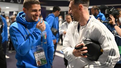 PSG teammates Marco Verratti of Italy and Lionel Messi of Argentina. Getty Images