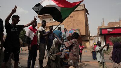 Anti-military protesters march in Khartoum. AP