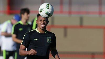 Brazil’s Gabriel Jesus controls the ball during a Brazil Olympic team training session in Brasilia, Brazil, Aug. 1, 2016. Brazil holds its first match against South Africa on August 4. (AP Photo/Eraldo Peres)