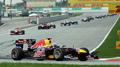 Red Bull driver Sebastian Vettel is looking unstoppable winning again, this time at the Sepang circuit despite having his own problems. Roslan Rahman / AFP