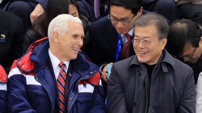 President Moon Jae-in talks to US Vice President Mike Pence at Gangneung Ice Arena in Gangneung while watching a short track speed skating event. Yonhap / EPA EPA/YONHAP SOUTH KOREA OUT
