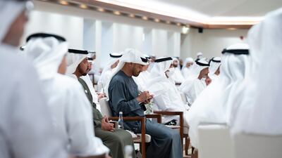 Sheikh Mohamed bin Zayed, Crown Prince of Abu Dhabi and Deputy Supreme Commander of the Armed Forces, takes notes during the lecture. Pictured with Sheikh Mohamed is Sheikh Hamdan bin Zayed, Ruler’s Representative in Al Dhafra Region. Abdulla Al Neyadi / Ministry of Presidential Affairs