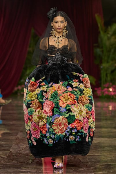 An exaggerated skirt covered in cross-stitched florals in the Alta Moda 2026 show. Photo: Dolce & Gabanna