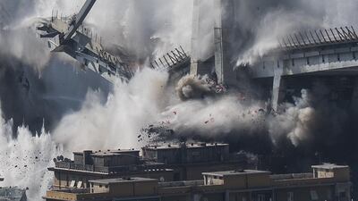 The demolition of the large towers '10' and '11' of the Morandi bridge using micro-explosive charges, in Genoa, northern Italy. EPA