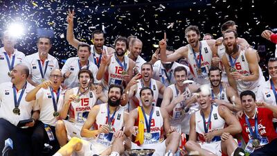 Spanish players celebrate after triumphing in the 2015 EuroBasket final over Lithuania on Sunday. Yoan Valat / EPA