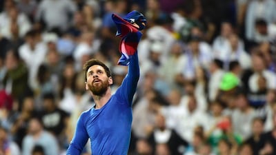 Barcelona's Lionel Messi celebrates after scoring the winning goal against Real Madrid at the Santiago Bernabeu stadium in Madrid on April 23, 2017. Gerard Julien / AFP