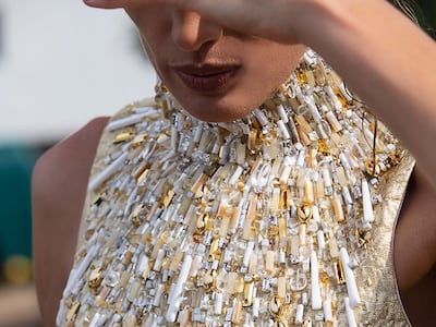 Stephane Rolland's couture was encrusted with unexpected details, such as this antiqued gold gown with marble, amber and citrin beading