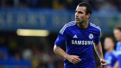 Cesc Fabregas and Chelsea top the Premier League table by 10 points with six matches remaining. Ben Stansall / AFP