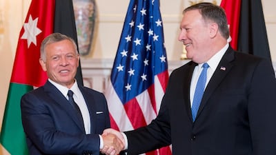 US Secretary of State Mike Pompeo and King Abdullah II of Jordan shake hands during a photo opportunity for members of the news media before their working luncheon at the State Department in Washington, DC. Michael Reynolds/ EPA