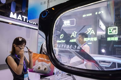 A visitor tests AI smartglasses during the Beyond Expo technology exhibition in Macau on May 29. The AI age is creating a new set of strategic assets. AFP