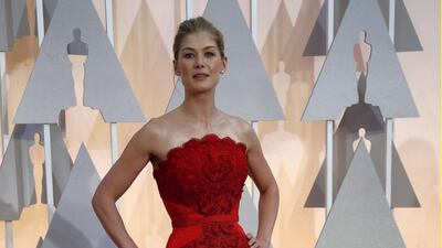 2015: Rosamund Pike wears Givenchy Haute Couture for the 87th Academy Awards. Reuters