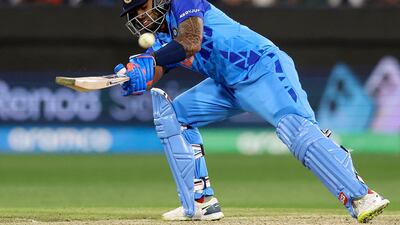 India's Suryakumar Yadav plays a shot during the ICC men's Twenty20 World Cup 2022 cricket match between India and Zimbabwe at Melbourne Cricket Ground (MCG) on November 6, 2022 in Melbourne. (Photo by Martin KEEP / AFP) / -- IMAGE RESTRICTED TO EDITORIAL USE - STRICTLY NO COMMERCIAL USE --