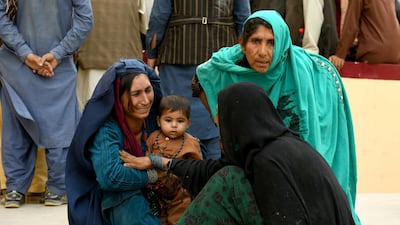 Relatives react in front of a hospital, where their family member has been transferred for treatment after a truck bomb blast in Balkh province, in Mazar-i-Sharif, Afghanistan August 25, 2020. REUTERS/Stringer NO RESALES. NO ARCHIVES.