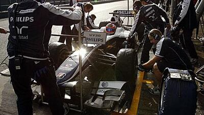 Rubens Barrichello makes a stop at the pit-lane during the Formula One pre-season test session at Jerez.
