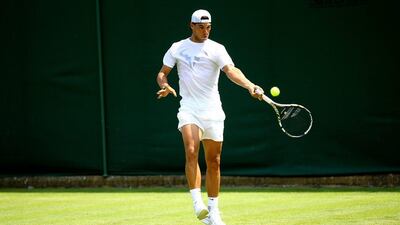 Rafael Nadal practices on grasscourt on Saturday ahead of Wimbledon in London, England. Al Bello / Getty Images / June 21, 2014