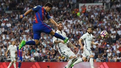 Luis Suarez of Barcelona shoots. David Ramos / Getty Images
