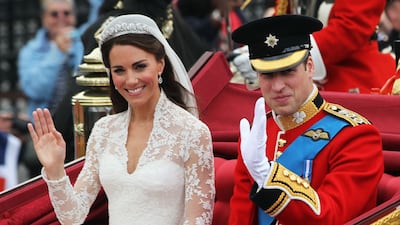 The Duke and Duchess of Cambridge on their way to Buckingham Palace after their wedding at Westminster Abbey on April 29, 2011. Getty Images