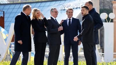 From left, Mr Tusk, Ms Zelenska, Mr Starmer, Mr Macron, Mr Zelenskyy and Mr Merz. AFP