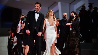 Affleck and Lopez seem to take joy in walking the red carpet as a reunited couple. AFP