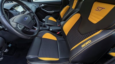 Inside, there are more clues aplenty of its racy credentials, such as the Recaro racing seats. Chris Whiteoak / The National