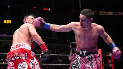 Danny Garcia, right, throws a punch at Robert Guerrero during their WBC championship welterweight bout, Saturday, Jan. 23, 2016, in Los Angeles. (AP Photo/Mark J. Terrill)