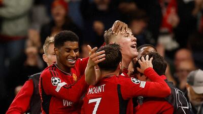 Manchester United's Rasmus Hojlund celebrates scoring the second goal with teammates. Reuters