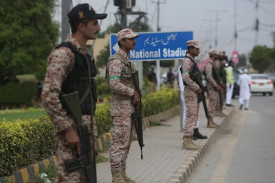 Pakistani security personnel stand guard outside the National Stadium in Karachi, where the opening ODI between Pakistan and Sri Lanka is being held on Friday. AP
