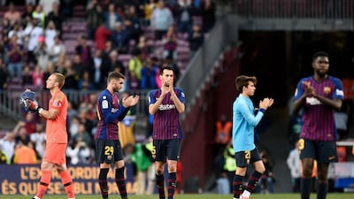 Barcelona's players applaud the fans after the game. AFP
