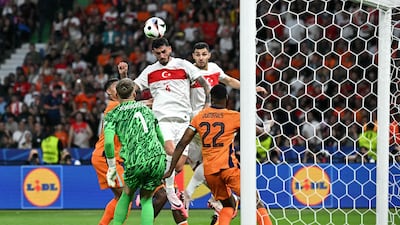 Turkey's Samet Akaydin heads home. AFP