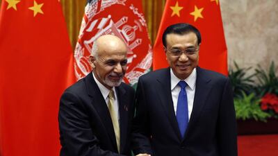 China's premier Li Keqiang, right, with Afghanistan's president Ashraf Ghani in Beijing last month. Kim Kyung-Hoon / AFP