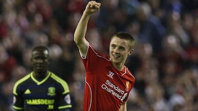 Liverpool's Jordan Rossiter celebrates after scoring the opening goal against Middlesbrough in the League Cup on Tuesday night. Liverpool won a penalty shootout after a 2-2 draw. Andrew Yates / Reuters / September 23, 2014