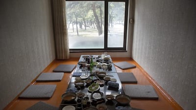 Finished lunches on a restaurant table in the city of Wonsan, North Korea.