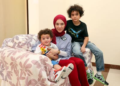 Shahenda Al Bakri with her sons. Chris Whiteoak / The National
