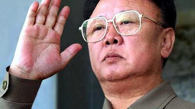 Kim Jong-il returns a salute as he reviews a military parade in Pyongyang during celebrations for the 60th anniversary of the communist party in this October 10, 2005 file photo. REUTERS/Korea News Service/Files