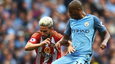 Fernandinho, right. (Stu Forster / Getty Images)