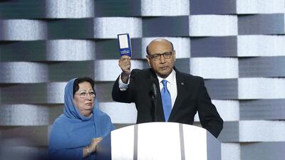 Father of fallen American soldier HumanKhan and his wife Ghazala Kahn, holding a copy of the United States Constitution on stage during final day of the Democratic National Convention at the Wells Fargo Center in Philadelphia, Pennsylvania. Justin Lane / EPA